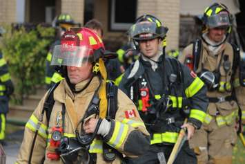 Firefighters at a fire at 234 Brock St. in Windsor, October 29, 2015.  (Photo by Adelle Loiselle)
