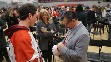 Former NHL player Theo Fleury signs autographs for LCCVI students after speaking. April 6, 2016 (BlackburnNews.com Photo by Briana Carnegie)