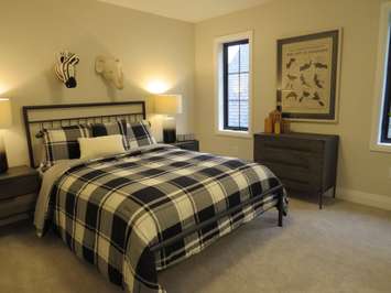 An upstairs bedroom inside the Dream Lottery home at 2397 Meadowlands Way. (Photo by Miranda Chant, Blackburn News)