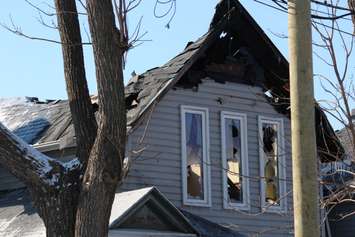 Firefighters at the scene of two house fires in the 800-block of Assumption St. in Windsor March 2, 2015. (Photo by Adelle Loiselle.)