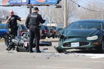 One person has been sent to hospital following a crash at the intersection of Lauzon Rd. and McHugh St., April 1, 2015. (Photo by Jason Viau)