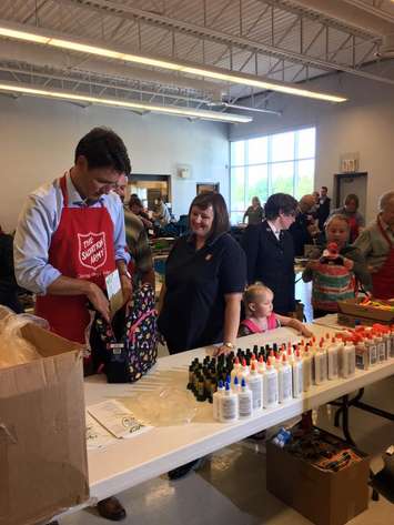 Prime Minister Justin Trudeau Packs Back Packs in Goderich. August 25th, 2017 (Photo by Bob Montgomery)