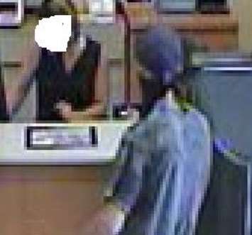 Police issue images captured during a bank robbery in Drayton on August 1, 2017. (Submitted by the OPP)