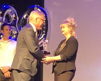 Bluewater Power CEO Janice McMichael-Dennis accepts Business Leadership Award Oct. 18, 2019 (Photo from Bluewater Power via Twitter)