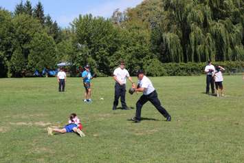 Softball game between students and CK first responders at Victor Lauriston Public School. September 13, 2016. (Photo by Natalia Vega)
