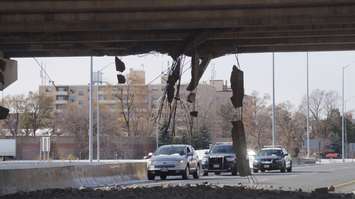Transport truck load hits Indian Rd. overpass. November 23, 2015 (BlackburnNews.com Photo by Briana Carnegie)