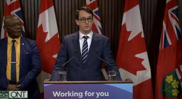 Labour Minister Monte McNaughton makes an announcement about migrant worker protections - Mar 20/23  (Photo courtesy of Ontario government via YouTube)