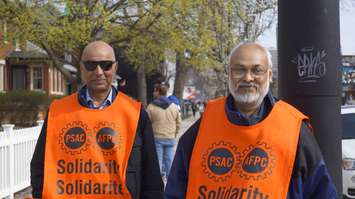 Public Service Alliance of Canada workers Randip Sandhu and Sruit Mahakul on the picket line in Sarnia. 20 April 2023. (Photo by Sarnia News Today)