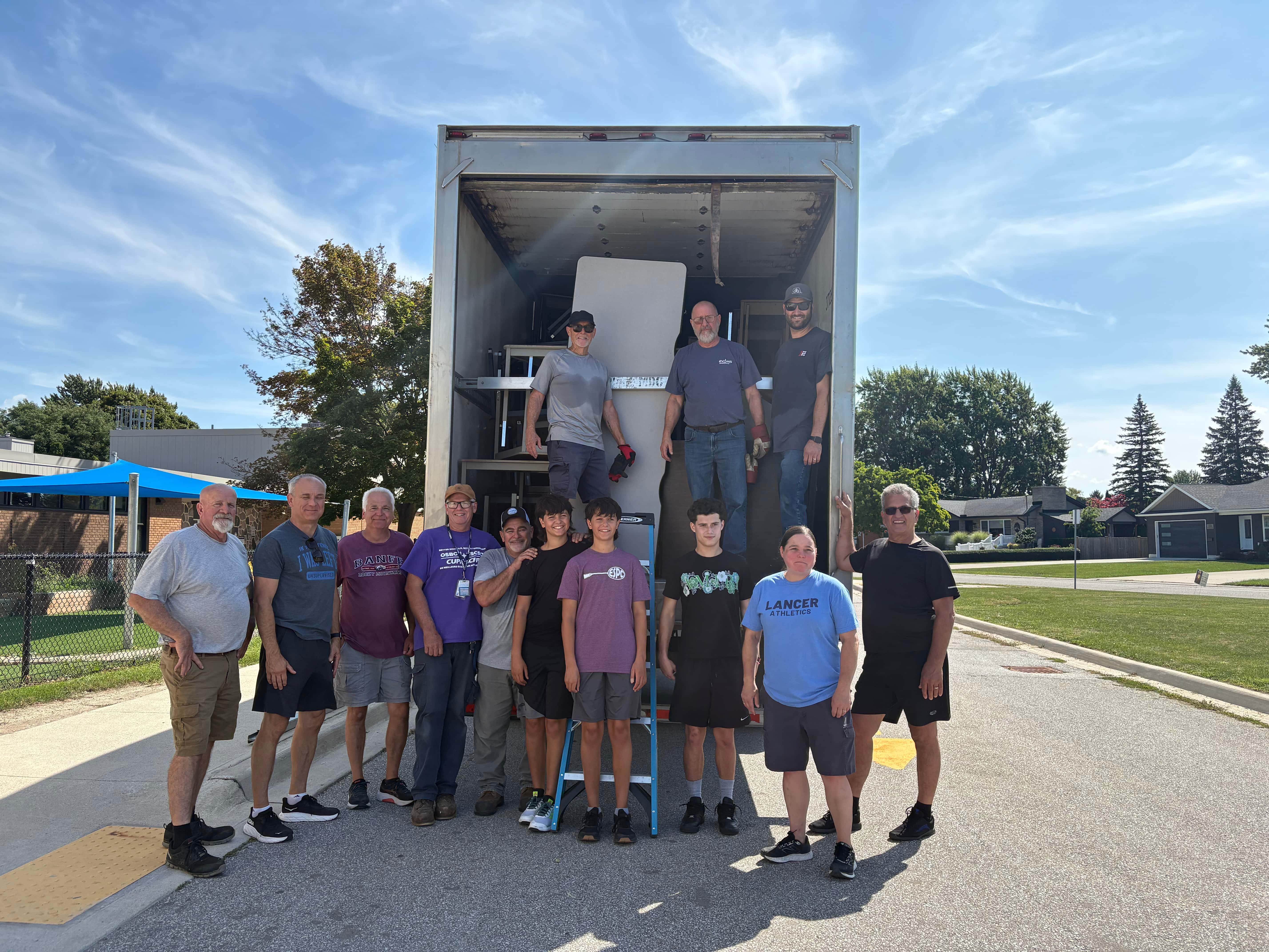 Local school furniture, books find new home abroad