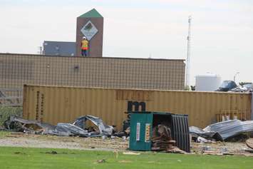 Crews assess and clean up the damage left near the EC Row Expressway and Central Avenue in Windsor on August 25, 2016 after a tornado hit the area. (Photo by Ricardo Veneza)