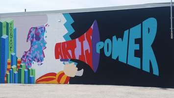 Students finish mural on the side of Kwik Kopy on Exmouth St. August 24, 2016 BlackburnNews.com photo by Jake Jeffrey