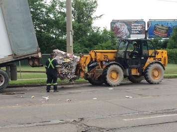 A transport carrying recycled paper collapses on Wyandotte St. E, June 12. 2015. (Photo by Jason Viau)