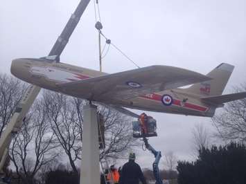 The F-86 Golden Hawk is returned to its pedestal at Germain Park December 2014 (BlackburnNews.com file photo by Josh Boyce)
