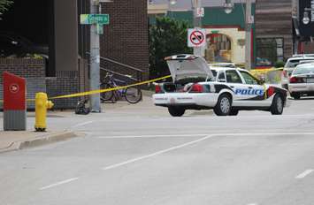 Windsor police investigate a suspicious package on the corner of Chatham St. and Goyeau St. downtown, June 17, 2015. (Photo by Mike Vlasveld)