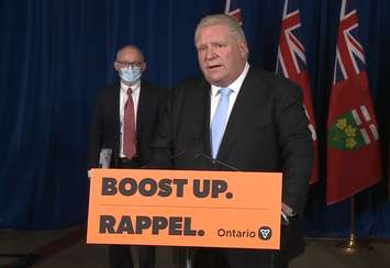 Premier Doug Ford joined by Chief Medical Officer Dr. Kieran Moore announce additional public health measures. December 17, 2021. (Capture via Premier of Ontario on YouTube.) 
