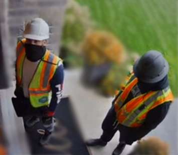 Two men dressed as construction workers wanted in connection with an armed robbery in Woodstock, October 14, 2021. Photo courtesy of Woodstock police. 