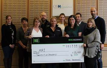Along with a team of their staff, Tim & Kristy Nicol of Nicol Insurance Inc. present a $25,000 cheque to Owen Sound Regional Hospital’s MRI Charge Tech Shelley Boyd, GBHS CFO Martin Mazza and Director of MRI Services, Christian Baldaulf – Radiologist in support of bringing a new MRI to the Owen Sound Regional Hospital. (photo submitted)