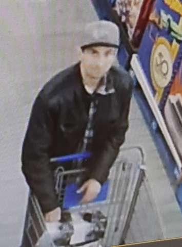 A surveillance image of a man wanted in relation to a robbery at the Strathroy Wal-Mart, January 6, 2019. Photo courtesy of Strathroy-Caradoc police.