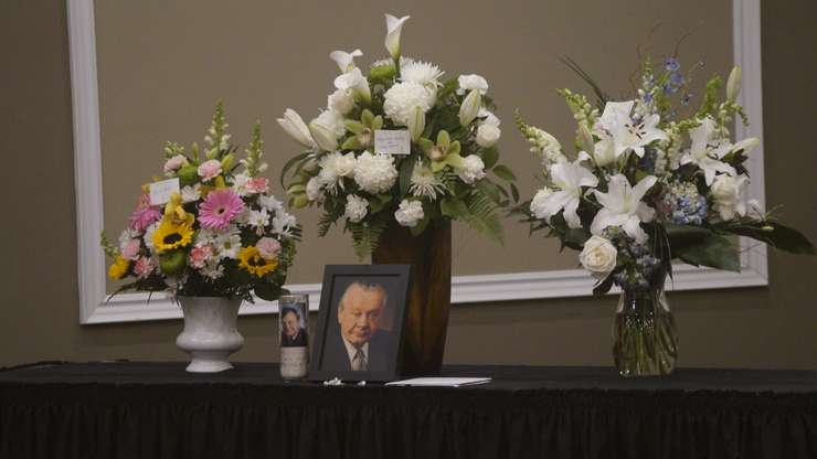 Photos and flowers are placed as a tribute to Andy Brandt at a luncheon held to remember him. January 18, 2024 Blackburn Media photo by Melanie Irwin