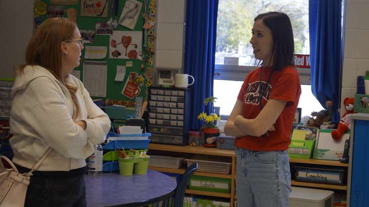 Teacher Shannon Stickley talking with a parent at Sacred Heart (Photo by: Lindsay Newman/ Blackburn Media)