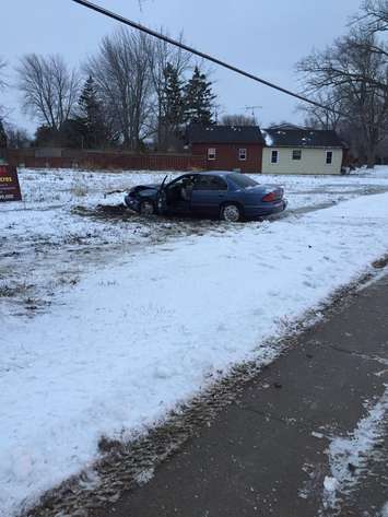 Police investigate after a car collides with a hydro police on County Rd. 20 in Amherstburg, January 10, 2016. (Photo courtesy of the Amherstburg Fire Department)