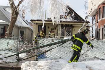 Windsor firefighters respond to a blaze at 761 Windsor Ave. on February 18, 2015. (Photo by Jason Viau)