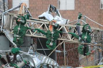 Crews assess and clean up the damage left near the EC Row Expressway and Central Avenue in Windsor on August 25, 2016 after a tornado hit the area. (Photo by Ricardo Veneza)