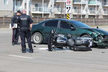 One person has been sent to hospital following a crash at the intersection of Lauzon Rd. and McHugh St., April 1, 2015. (Photo by Jason Viau)