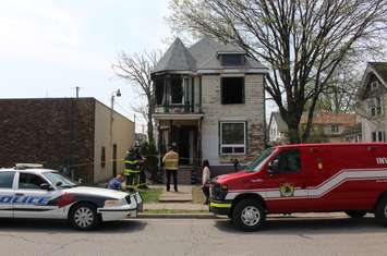 Windsor police continue to investigate at 579 Church St. after an arson, May 6, 2015. (Photo by Mike Vlasveld)