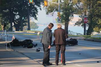 Investigators at the scene of a two-motorcycle crash on Riverside Dr. W, September 23, 2015.  (Photo by Adelle Loiselle)