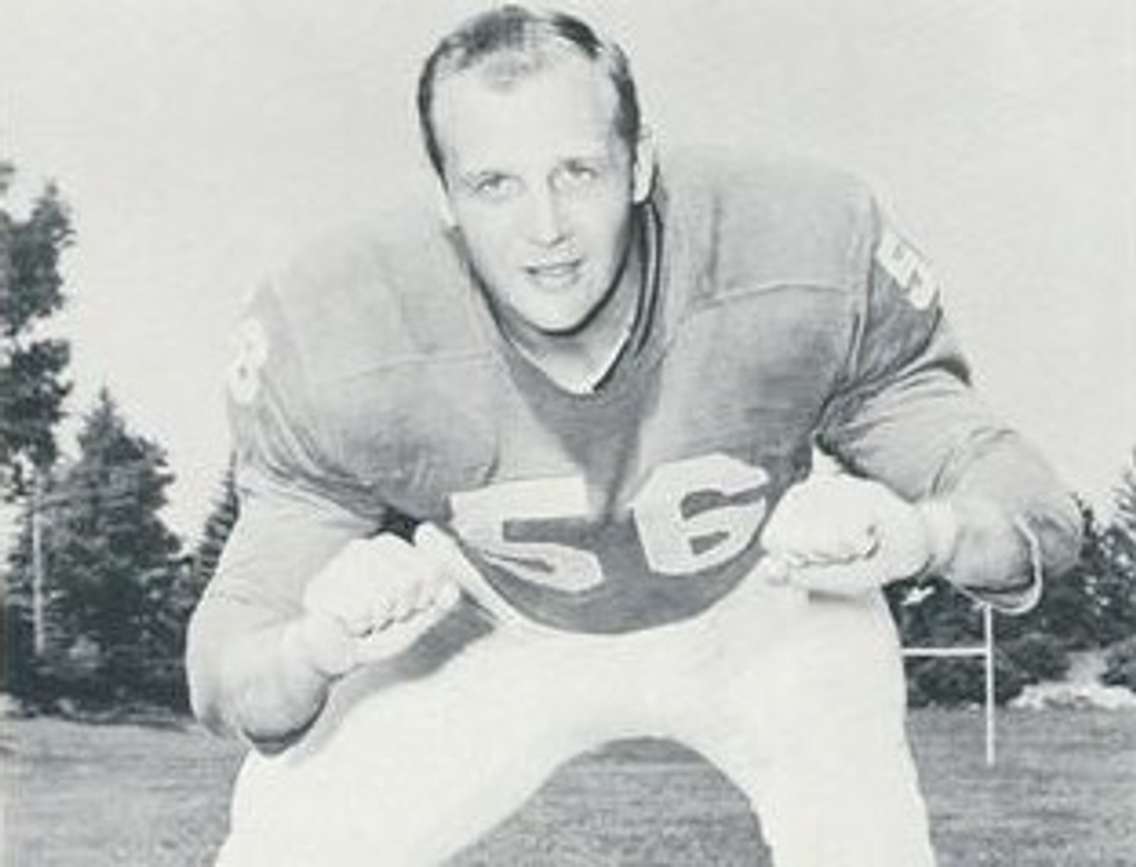 Joe Schmidt in a 1961 promotional photo. Public domain.