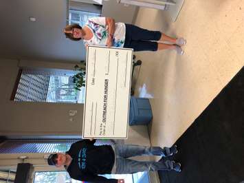 Jason Stoner of the Erieau Wind Farm with Brenda LeClair of Chatham Outreach For Hunger. May 2020. (Photo courtesy of Jason Stoner).