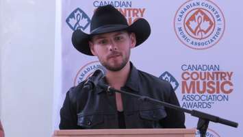 Brett Kissel speaking to reporters back stage at the CCMA Awards in London, September 11, 2016. (Photo by Miranda Chant, Blackburn News)