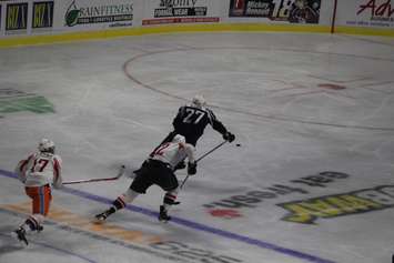 Hayden McCool charges forward with the puck in the Windsor Spitfires annual Blue and White game on August 31, 2016. (Photo by Ricardo Veneza)