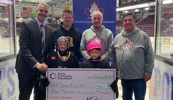 Back Row: Left to Right Nathan Jeffrey and Andrew Gardiner (Jr. Lady Sting), Mike Derry and Steve Gelinas (Cousi Group) and Front Row Lady Jr Sting U9 Goalies - Lilah T. and Ainsley K. (Photo courtesy of the Cousi Group)