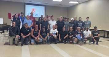 Employees of Titan Tool and Die, October 7, 2025. (Photo by Maureen Revait)
