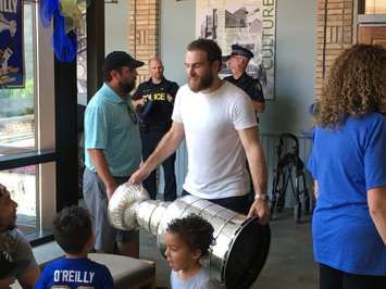 O'Reilly shares the Cup with some local kids inside the Goderich Town Hall. (Photo by Ryan Drury)