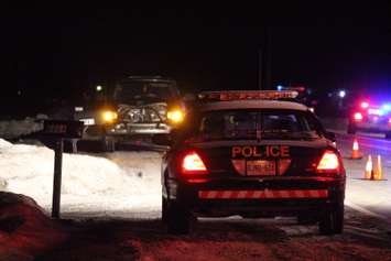 OPP officers investigate a fatal incident on Walker Rd. in Oldcastle, February 9, 2015. (Photo by Mike Vlasveld)