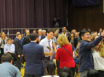 Prime Minister Justin Trudeau is presented with an eagle feather at his London town hall meeting, January 11, 2018. (Photo by Miranda Chant, Blackburn News)