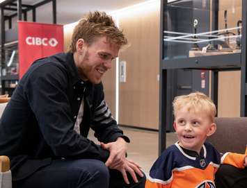 Easton Oetting and Connor McDavid. March 2023. (Photo courtesy of CIBC)