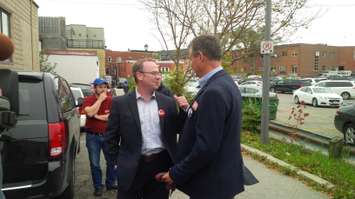 Perth-Wellington Liberal Candidate Stephen McCotter talks with Huron-Bruce Liberal candidate Allan Thompson ahead of Justin Trudeau's visit to Stratford (Photo by Bob Montgomery) 