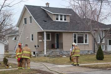 Tecumseh firefighters on the scene of a house fire on Lacasse Blvd. on March 9, 2016. (Photo by Ricardo Veneza)