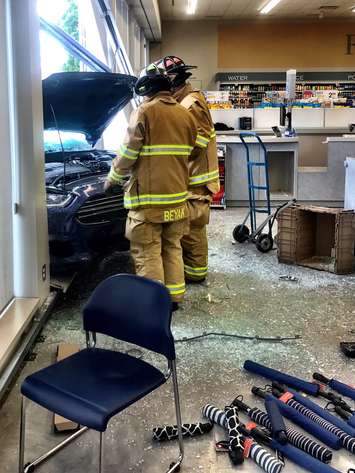 A vehicle crashes through the front windows of Shoppers Drug Mart on Michigan Ave.  June 19, 2017 (Photo courtesy of @SarniaFire Twitter)