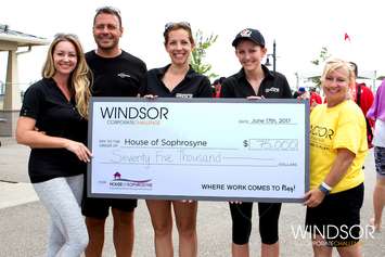 A cheque is presented to the House of Sophrosyne by organizers of the Windsor Corporate Challenge, June 2017. (Photo courtesy the Job Shoppe)
