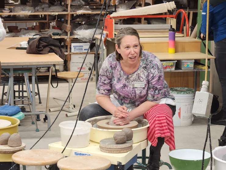 Lambton College Ceramics Professor Beth Turnbull-Morrish teaches the proper technique during the Celebrity Bowl-a-Thon - Mar 12/24 (Blackburn Media Photo by Josh Boyce)