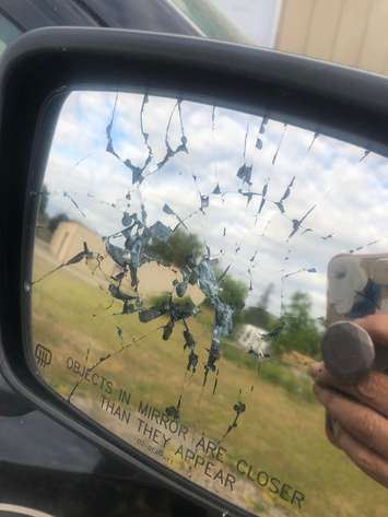 Smashed rear view mirror (Image courtesy of Kelly Spencer via Facebook)