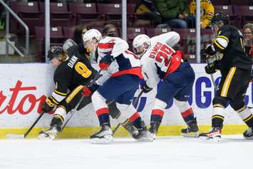 The Sarnia Sting battling the Windsor Spitfires in Game 3 of a first round playoff series.  26 April 2022. (Metcalfe Photography)