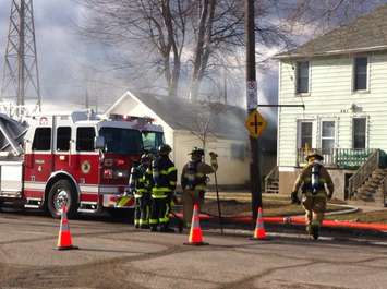 Windsor fire crews battle a blaze at 819 Wellington Ave., January 27, 2016. (Photo by Mike Vlasveld)