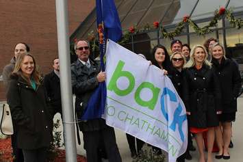 CK Local Immigration Partnership Project Co-ordinator Victoria Bodnar (left) and Mayor Randy Hope stand with other young members of the Chatham-Kent Community who recently moved back to CK, December 9, 2015.  (Photo by Simon Crouch) 