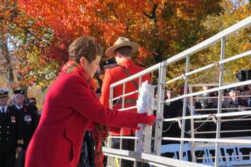 Silver Cross Mother Carolyn Wilson lays a wreath at the Remembrance Day ceremony at the Cenotaph in Victoria Park in London, November 11, 2016. (Photo by Miranda Chant, Blackburn News.)